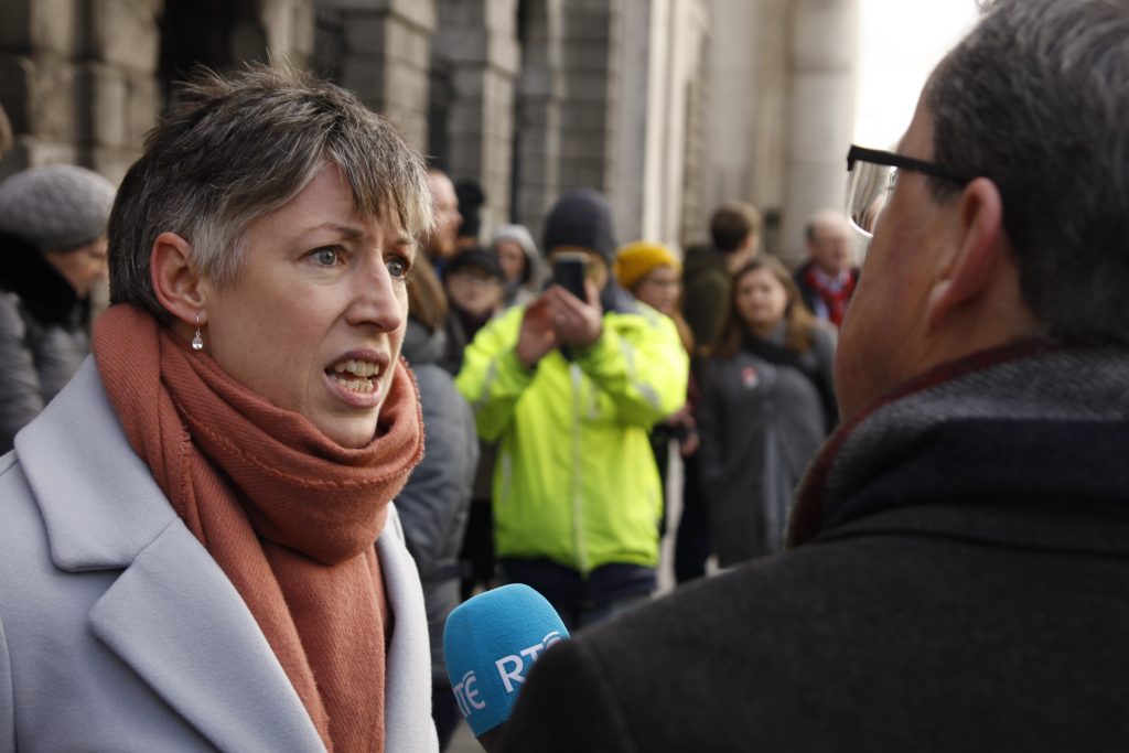 Sadhbh O'Neill of FiE addressing media at the High Court Photo: Niall Sargent